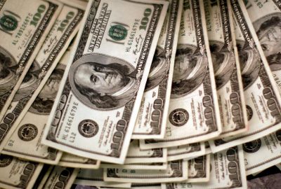 US Dollar Nearly Flat After Dipping on Soft Inflation