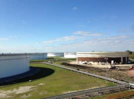 U.S. Crude Stockpile Surge Weighs on Oil Prices