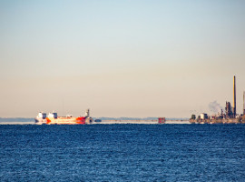 Iraq Devalues Dinar 14.5% as Hormuz Disruption Drains Oil Revenue