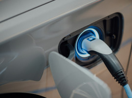 GM to Add Hybrids as U.S. Gasoline Holds Above $4